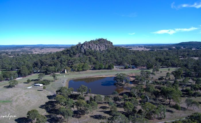 Hanging rock with dam in foreground